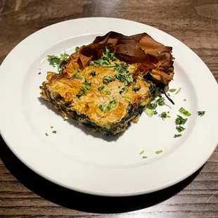 Spanakopita...HUH?!?  Was this supposed to be fancy? Was this a botched version???