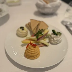 The Greek spreads - tzatziki, taramosalata* and htipiti, grilled pita, raw vegetables