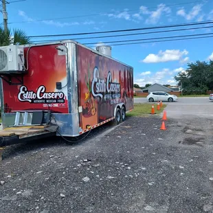 a delivery truck parked on the side of the road