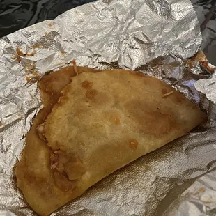 a burrito wrapped in foil