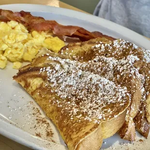 French toast, scrambled eggs and bacon.