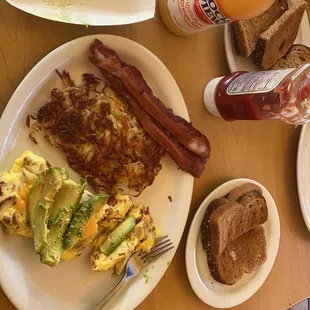 Avocado Cheese Omelette, plus bacon and orange juice!