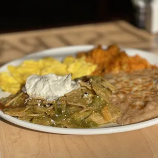 Chilaquiles (I asked for the sour cream on the side but it came out on top anyway)