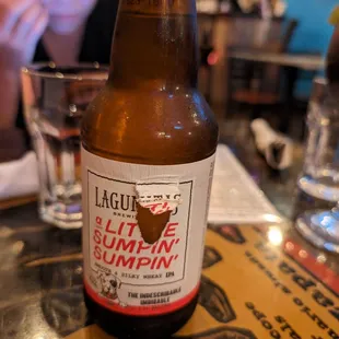 a bottle of beer on a table