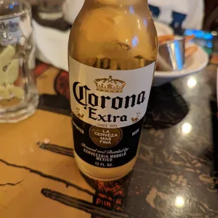 a bottle of beer on a table