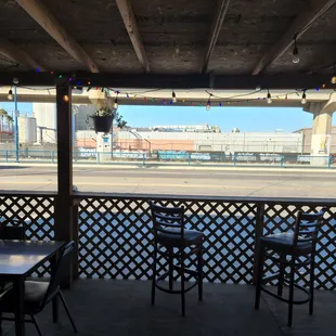 Outside seating looking toward the industrial street and the Bart train