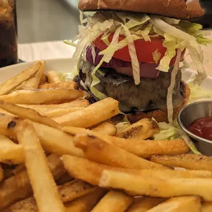 a hamburger and french fries on a plate
