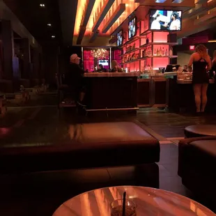 Lots of TVs and poker Machines at the bar