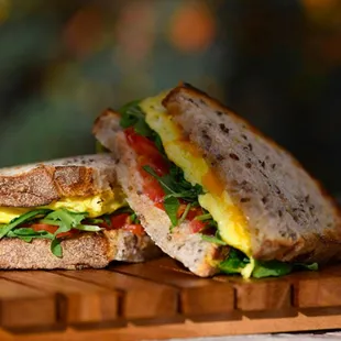 a sandwich on a cutting board