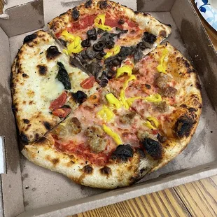 White pizza, italian left overs combined in one box.