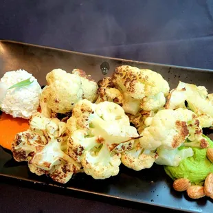 July 2021: Apperizer Roasted Cauliflower @ $10. See the steam:) PHENOMENAL