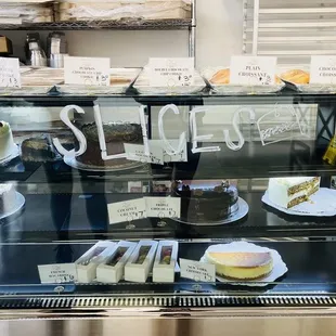 a display of cakes and pastries