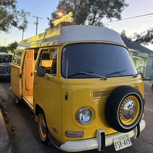 Front passenger view shows illuminated &quot;PHOTOS&quot; letters mounted atop our gorgeous Goldie!