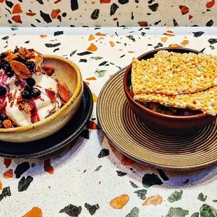 Almond cookie soft serve with huckleberry  Matcha tapioca pudding with crispy rice cracker