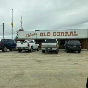 several trucks parked in a parking lot
