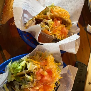 two burritos on a table