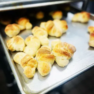 a tray of freshly baked croissants
