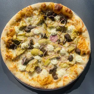 a pizza with various toppings