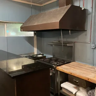 a kitchen with stainless steel appliances