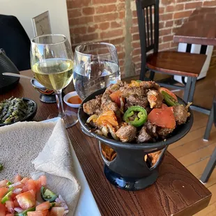 Lamb tibs. Unless you are a vegetarian, you HAVE to get this dish at this restaurant. It's the best, the best, the best.