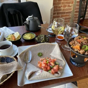 This is the lamb tibs, which is served with 3 veggie sides of your choice and injera.