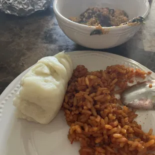Agusi Soup and fufu with jollof rice. Delicious!