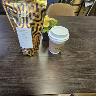 a cup of coffee and a bag of coffee