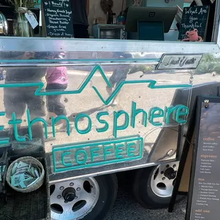 a coffee truck with a sign on the side