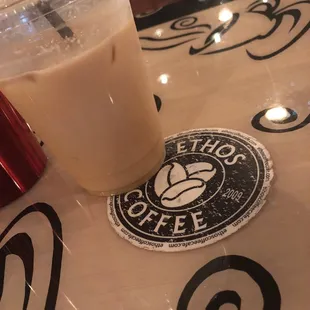 a cup of coffee on a table