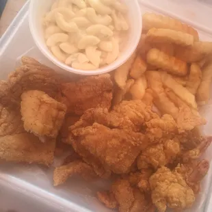 Supposedly 4 pieces of fish, watery macaroni salad, typical Ore Ida fries, the best thing they got going is there Fried Shrimp.