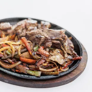 a skillet of food on a table