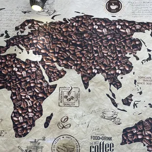 a map of the world made out of coffee beans