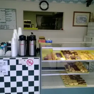 a counter with a variety of pastries