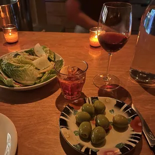 Marinated olives, gem salad