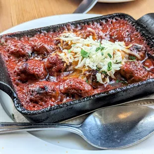 Excellent lamb meatballs with currants and pine nuts in an intense savory tomato sauce