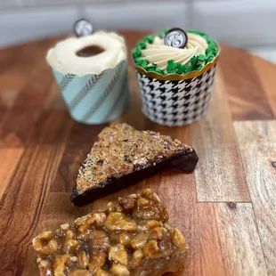 a slice of cake and a cupcake