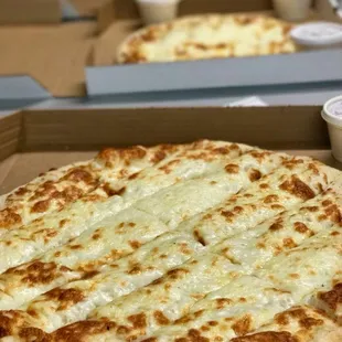 a cheese pizza in a box