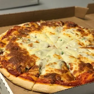 a pizza in a pizza box