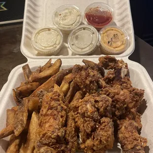 Pure goodness!!! Chicken finger, fries, dipping sauces: special sauce, black garlic aoli, spicy aioli