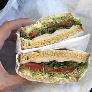 Smoked turkey, avocado &amp; garlic herb sandwich, no onions.