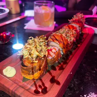 a sushi roll on a cutting board