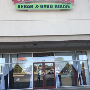 the front entrance of a restaurant