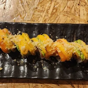 a plate of food on a wooden table