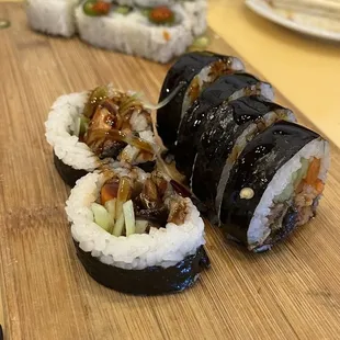 sushi on a wooden board