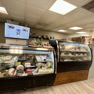 a display of cheeses and pastries