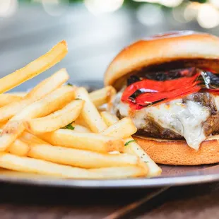 a burger and french fries on a plate