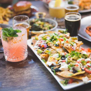 a table full of food and drinks