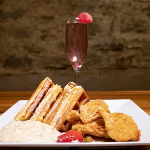 Chicken &amp; Waffles with house made sausage gravy.