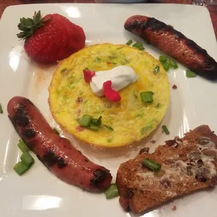 Breakfast morning 1 - entree. Savory egg bake with sausage and bread.