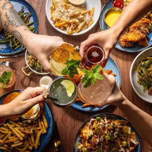 a table full of food and drinks